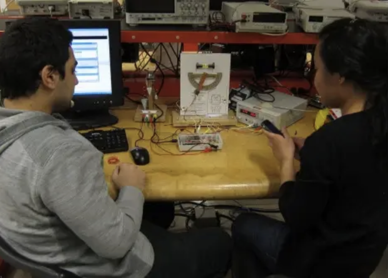 ELE 604 students working on an accelerometer lab exercise
